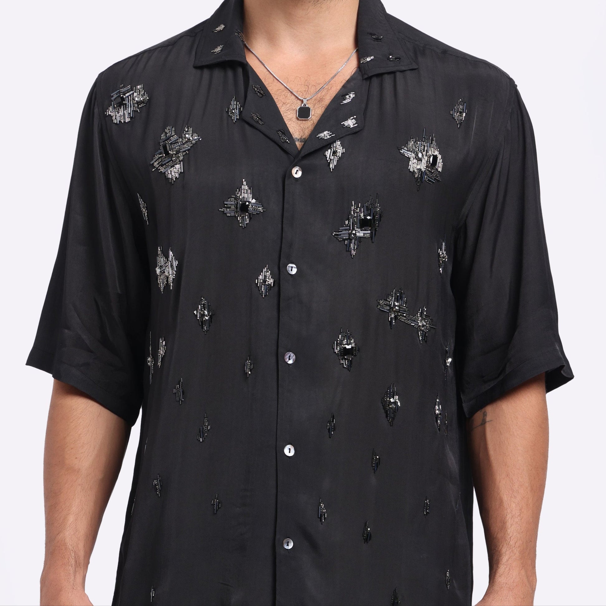 Trendy black men's fashion shirt with patterned design and short sleeves for stylish casual wear