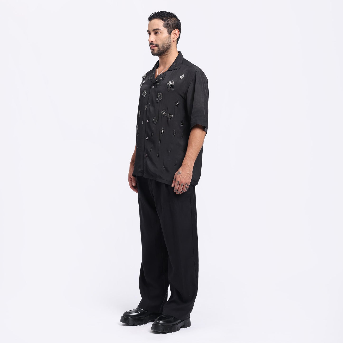 Stylera trendy black men's fashion shirt with unique embellishments for a stylish look