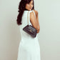 Trendy black shoulder bag for women with a stylish design and chain strap, perfect for any outfit