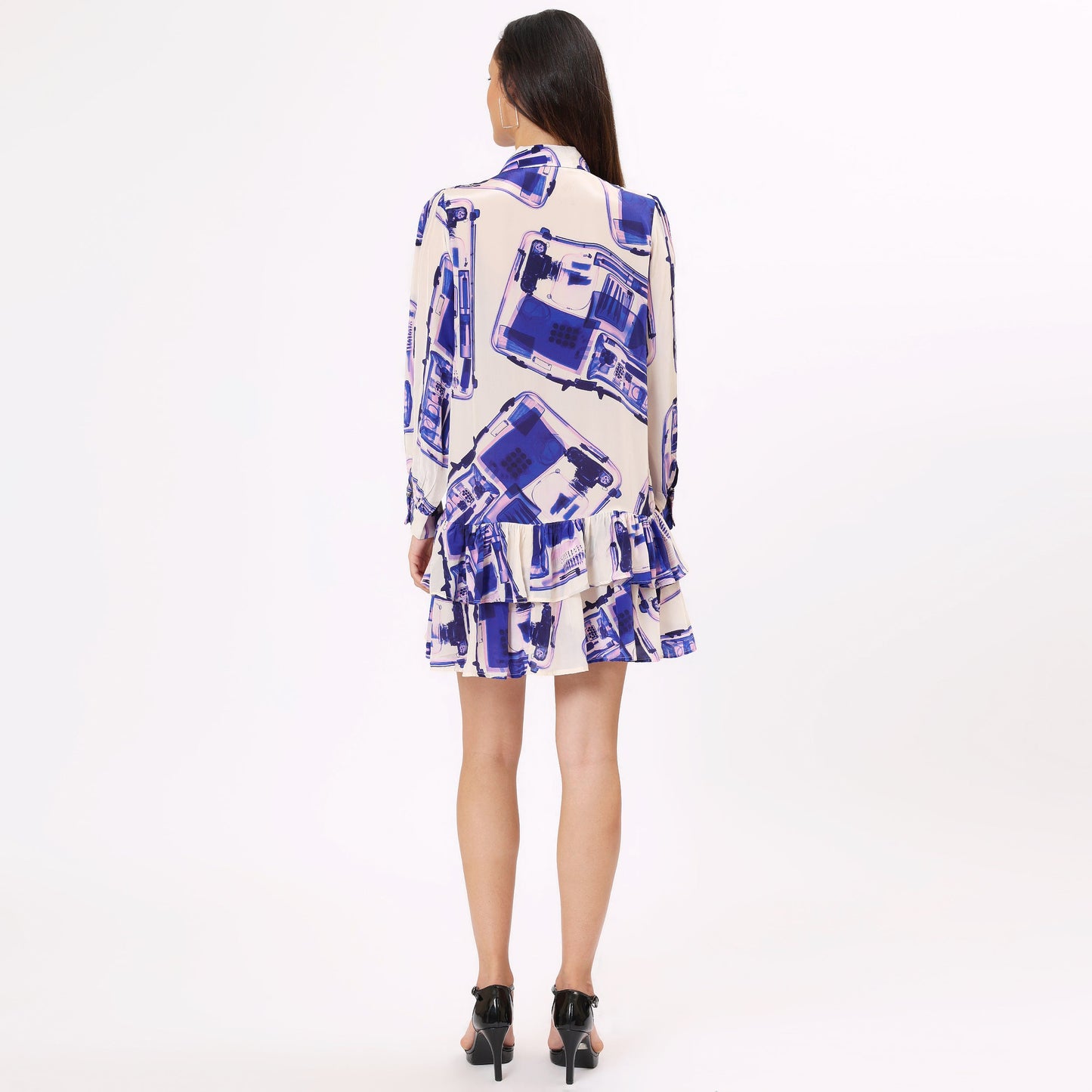 Back view of Stylera trendy blue casual dress for women with a ruffled hem and artistic print