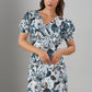 Trendy casual dresses for women featuring a floral print with a v-neckline and short puff sleeves