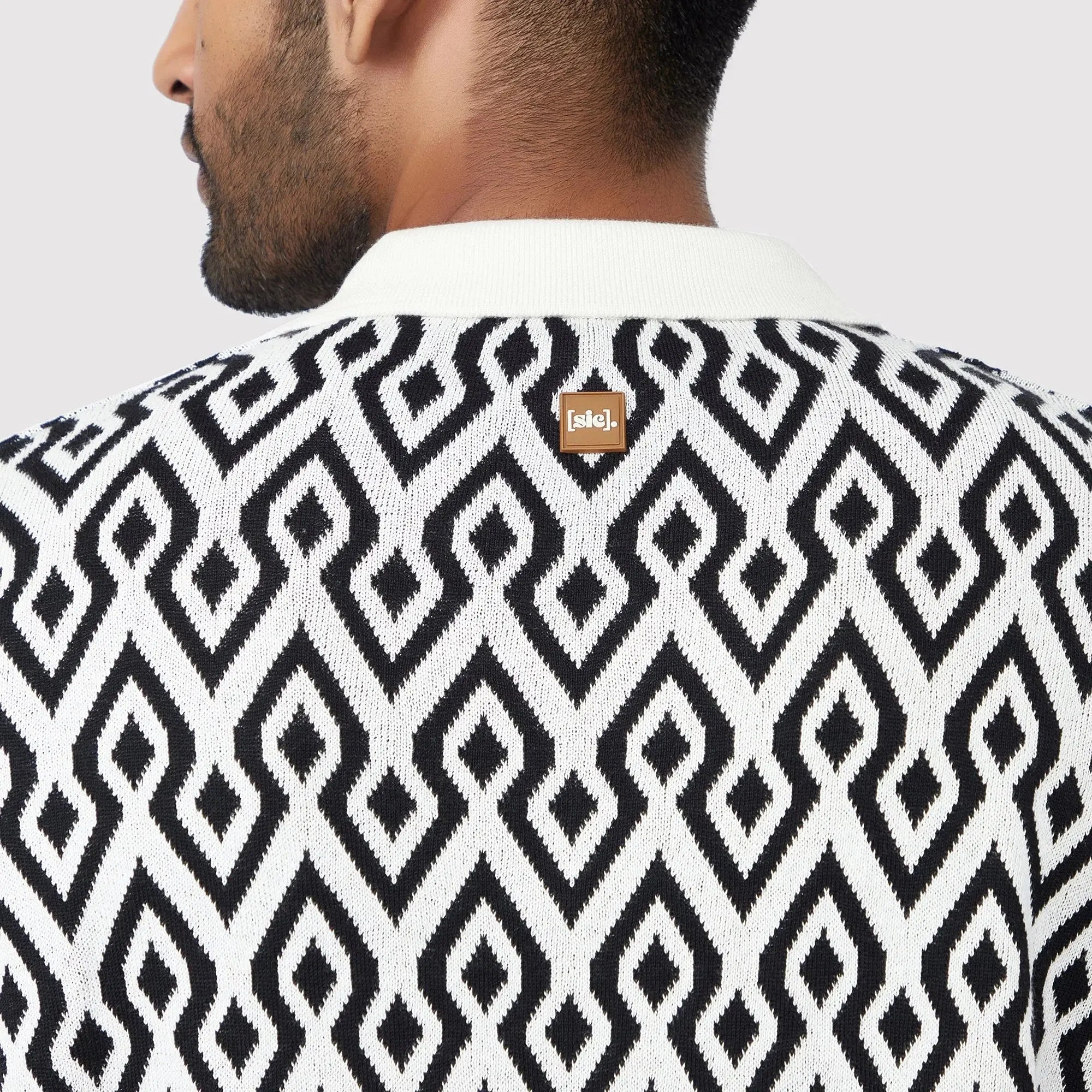 Back view of a knit polo with diamond pattern, a trendy casual polo for men by Stylera 