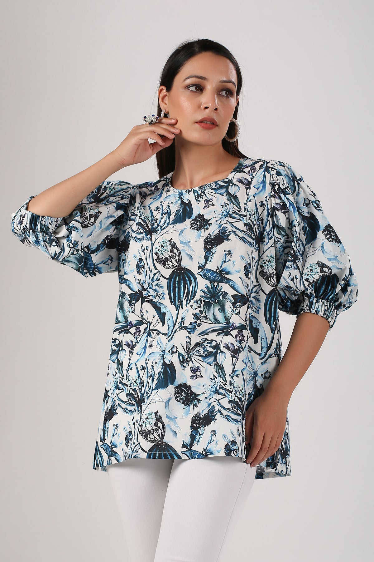 Trendy casual tops for women featuring a floral design and puff sleeves in light colors