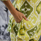 Trendy cotton two piece outfit in bright green and yellow with stylish pattern and pockets