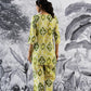 Woman wearing a Stylera trendy cotton two piece outfit with a vibrant green and yellow pattern
