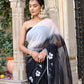 Trendsetting elegant party wear saree in black with floral embroidery and draped style