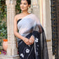 Trendy elegant party wear saree in black with floral embroidery and sheer pallu for festive occasions