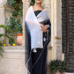 Trendy elegant party wear saree in black with floral design and matching shawl for special occasions