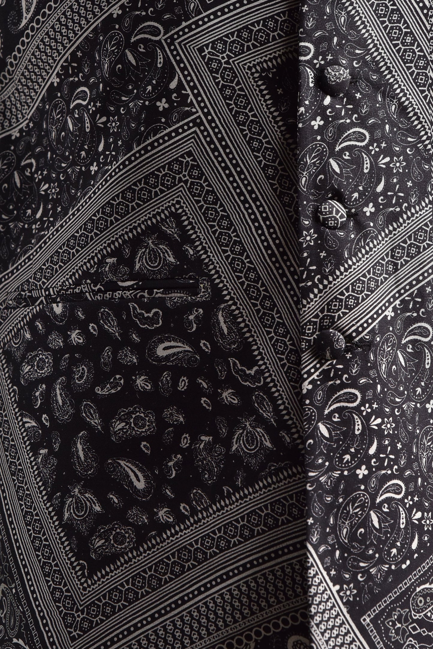 Trendy ethnic bandi jacket by Stylera featuring intricate black and white patterns for a stylish look