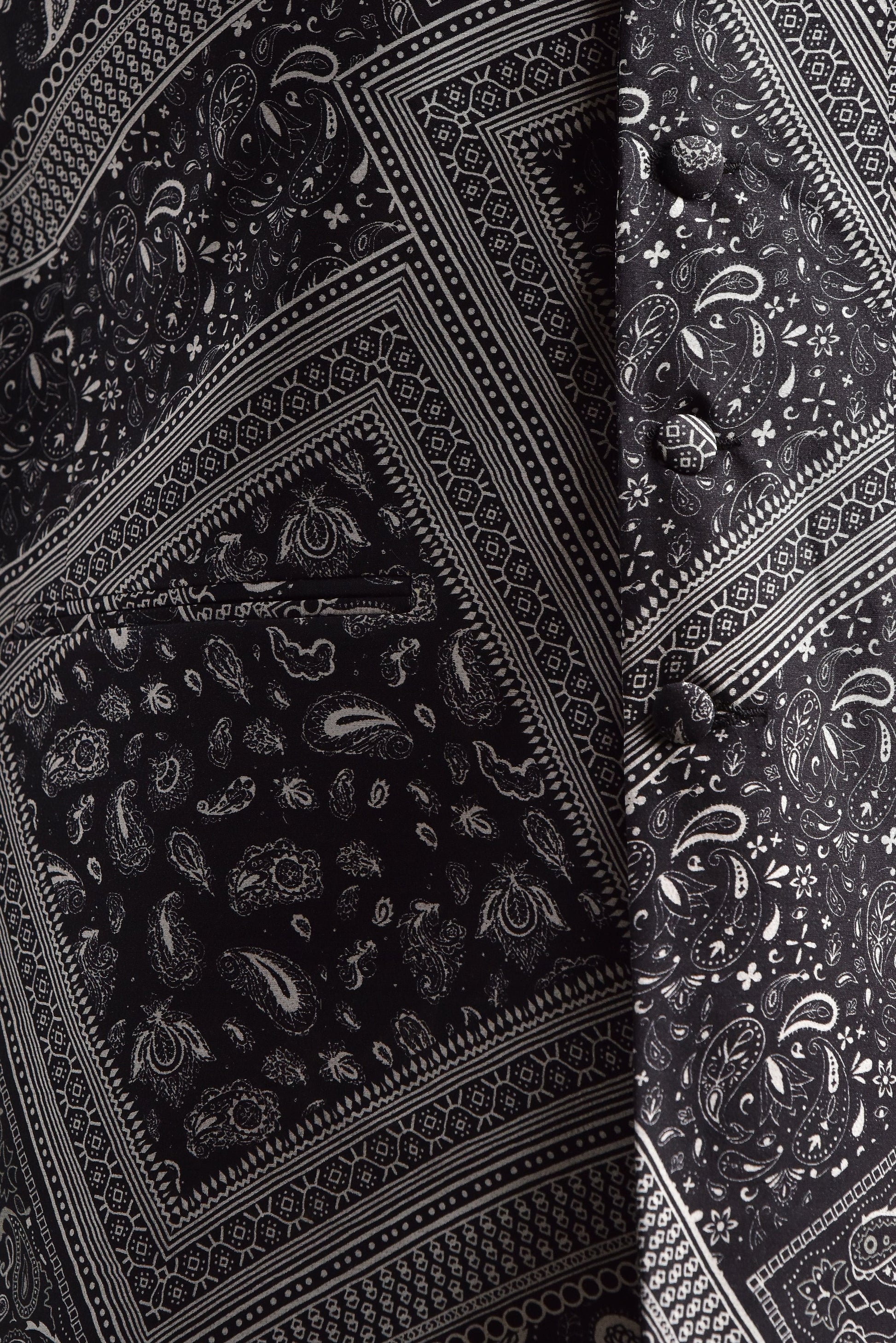 Trendy ethnic bandi jacket by Stylera featuring intricate black and white patterns for a stylish look