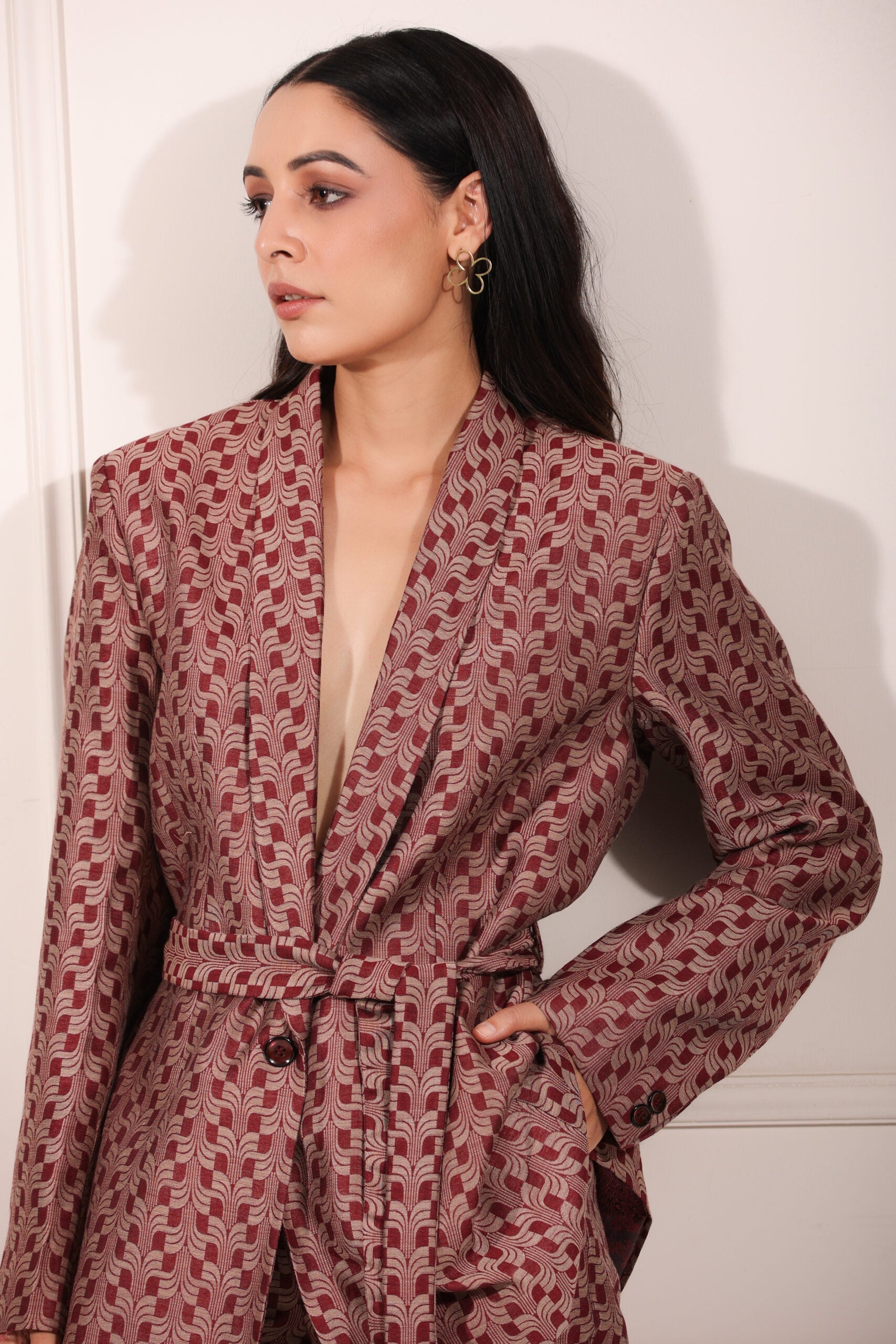Trendy ethnic blazer pant set with a stylish belt and elegant pattern for a modern look
