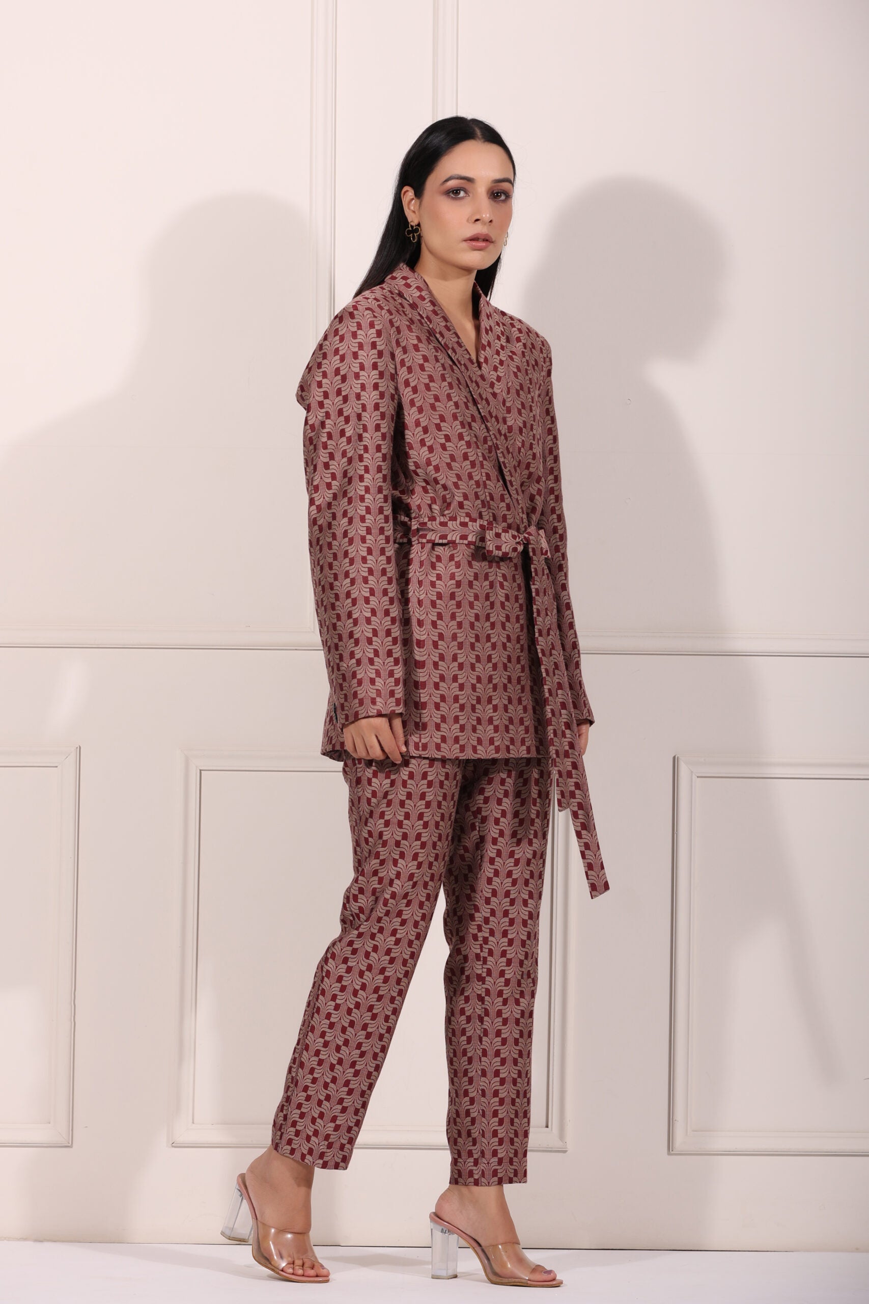 Trendy ethnic blazer pant set in maroon with a stylish tie detail and elegant pattern for chic occasions