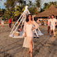 Trendy evening maxi dress in white, perfect for beach outings and summer events