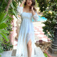 Trendy evening maxi dress in white with a flowing design and off-shoulder sleeves