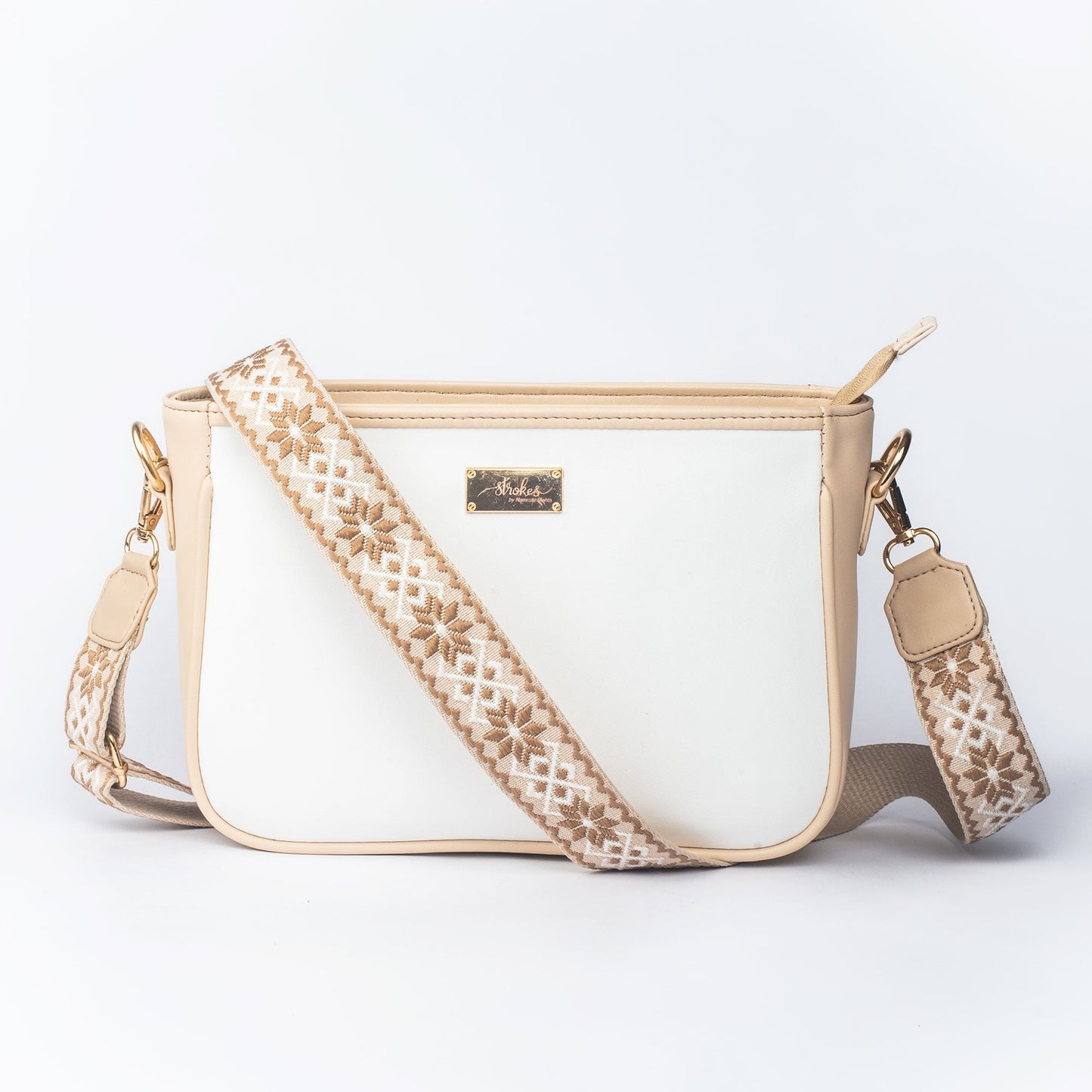 Stylish Stylera trendy everyday sling bag with a decorative strap and zipper closure