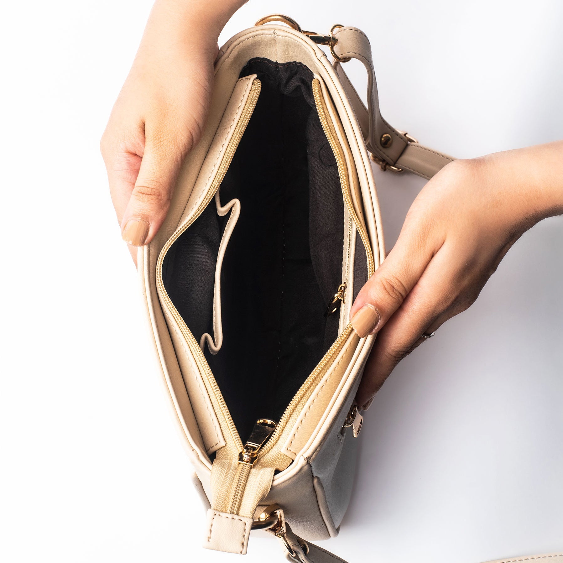 Inside view of a trendy everyday sling bag by Stylera by Namrata Mehta showing spacious compartments