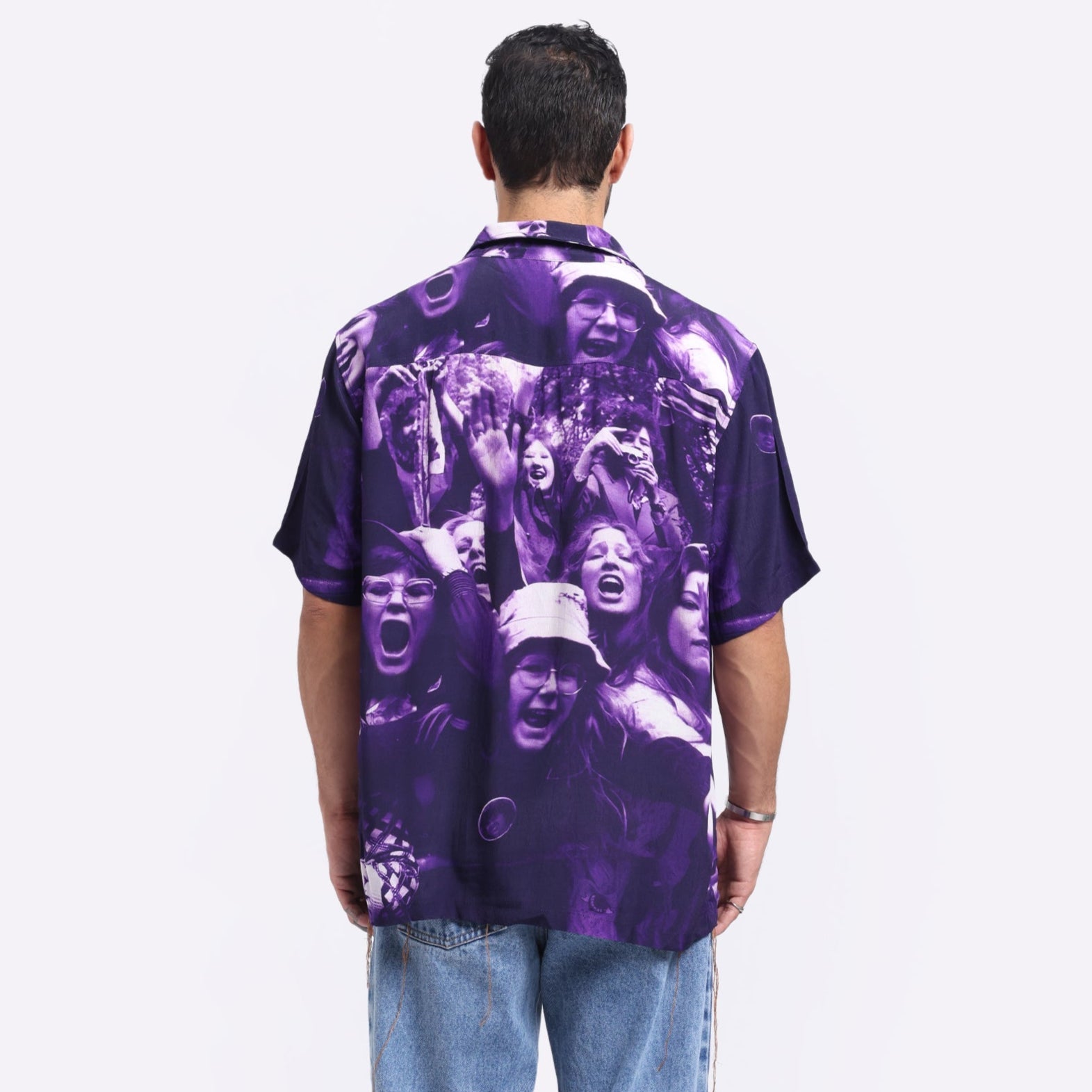 Stylera trendy graphic shirts for men featuring a vibrant purple crowd design on the back