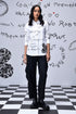 Stylera white button up shirt with black handwritten print on model trendy graphic shirts for women