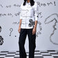 Stylera white button down shirt with black graffiti doodles on model trendy graphic shirts for women