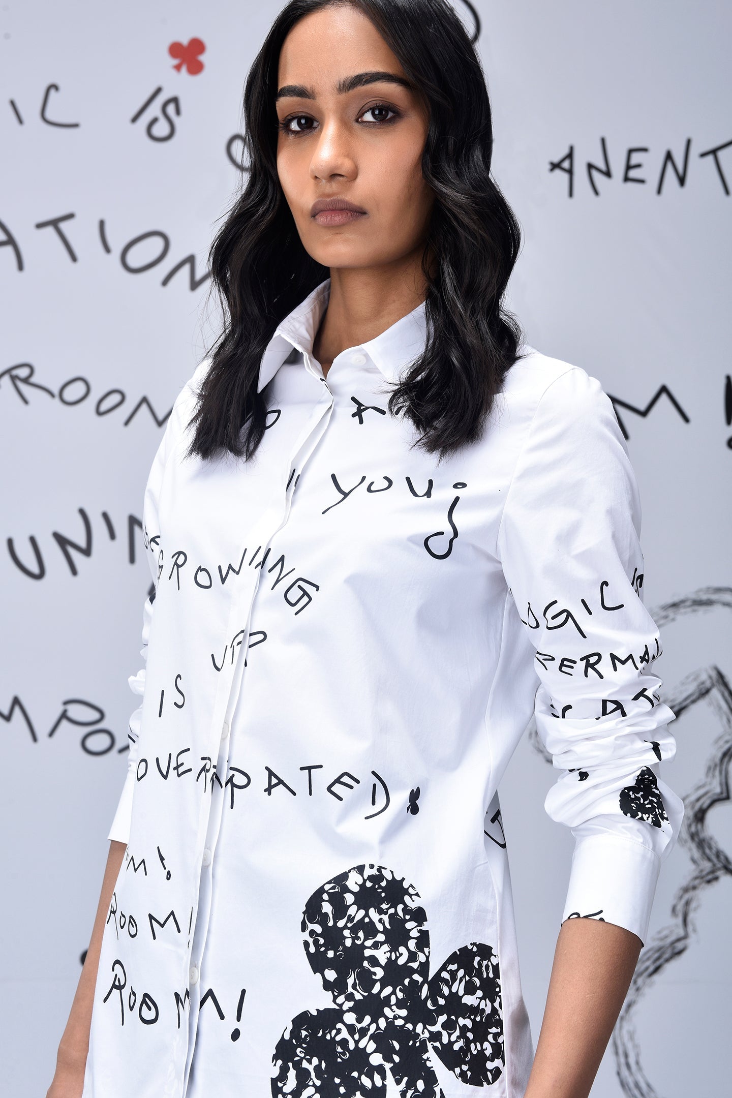 Stylera white button shirt with black handwritten graphics and floral print trendy graphic shirts for women