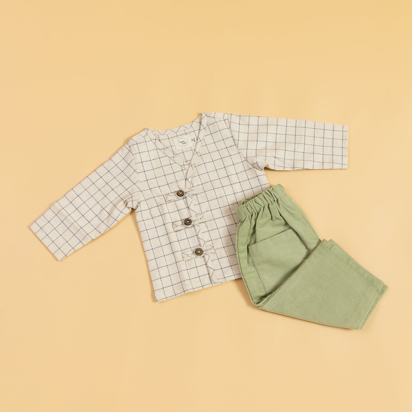 Stylera trendy kids coordinated set featuring a checkered top and green pants for stylish children