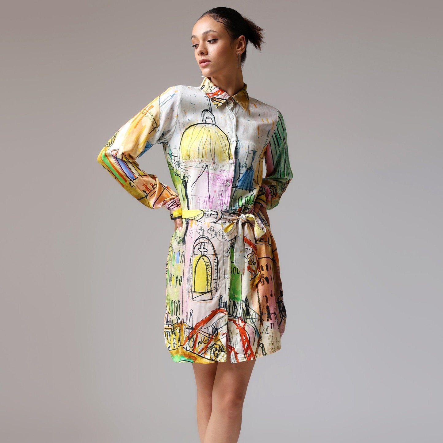 Stylera trendy long sleeve dress for spring with colorful artistic design and a cinched waist