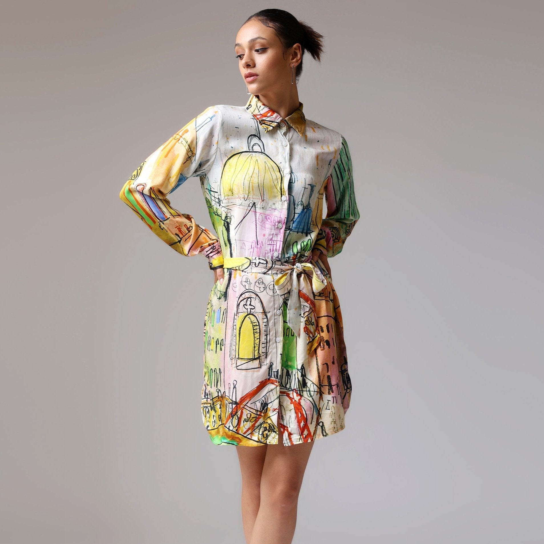 Stylera trendy long sleeve dress for spring with colorful artistic design and a cinched waist
