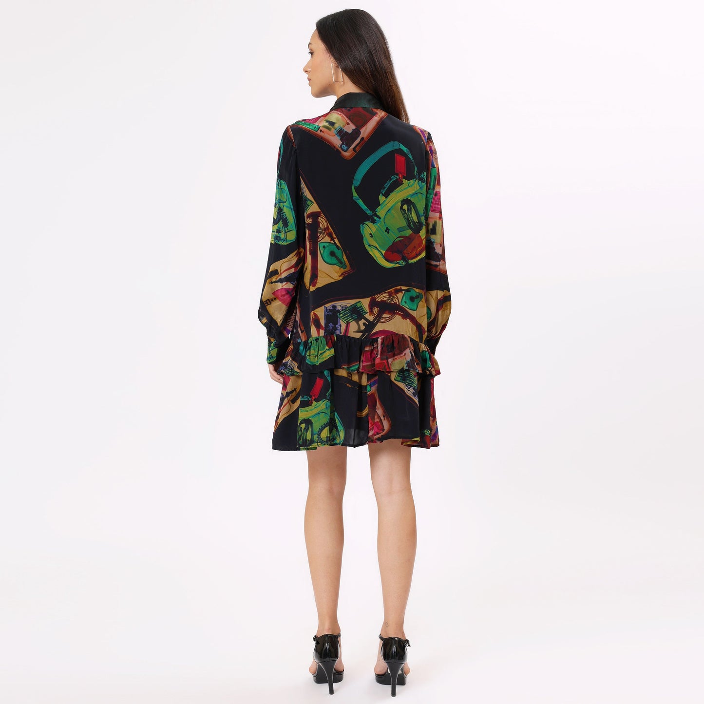 Stylera trendy long sleeve dress for women with a colorful abstract design and ruffled hem