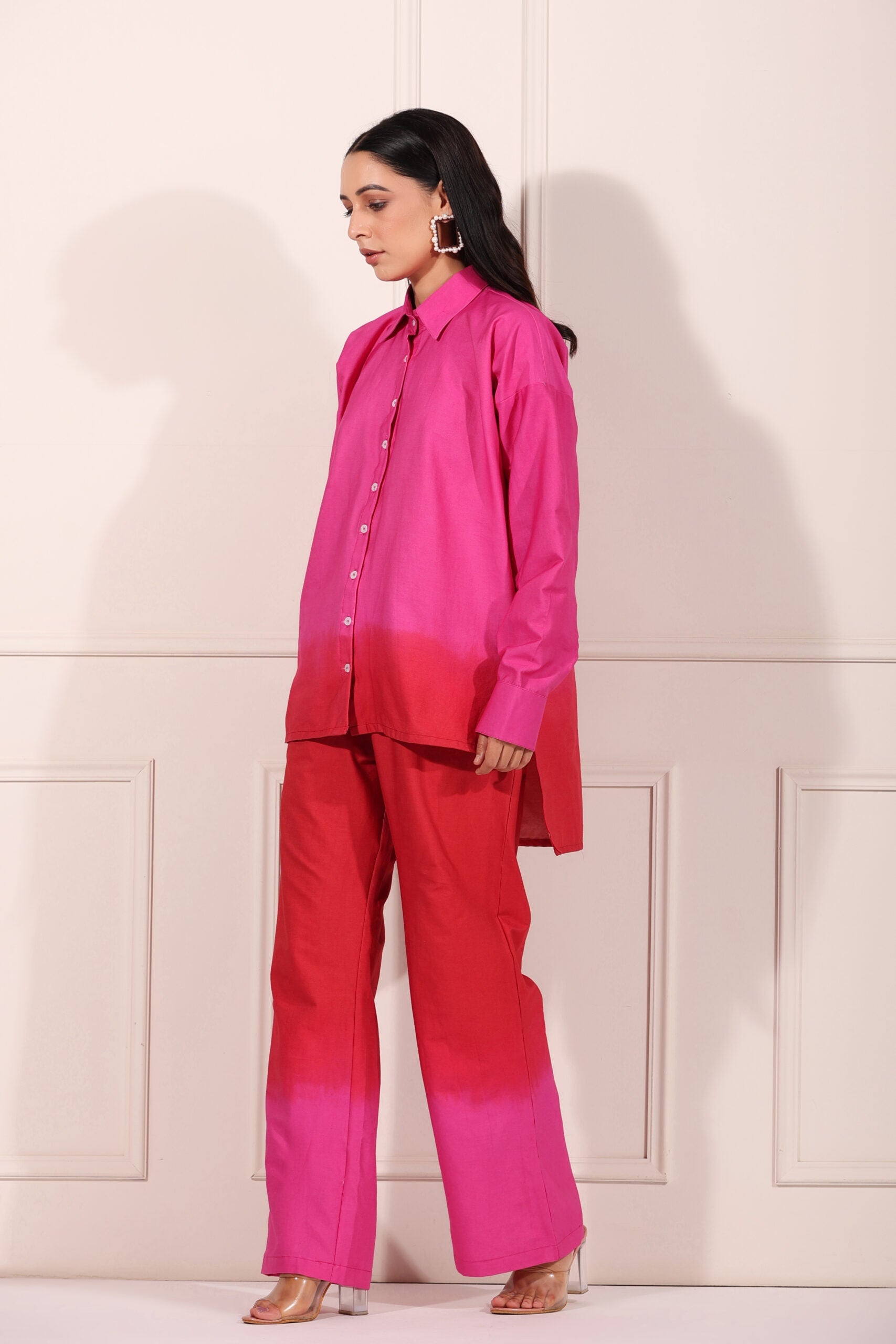Trendy matching outfits for women featuring a pink ombre shirt and red pants for a stylish look