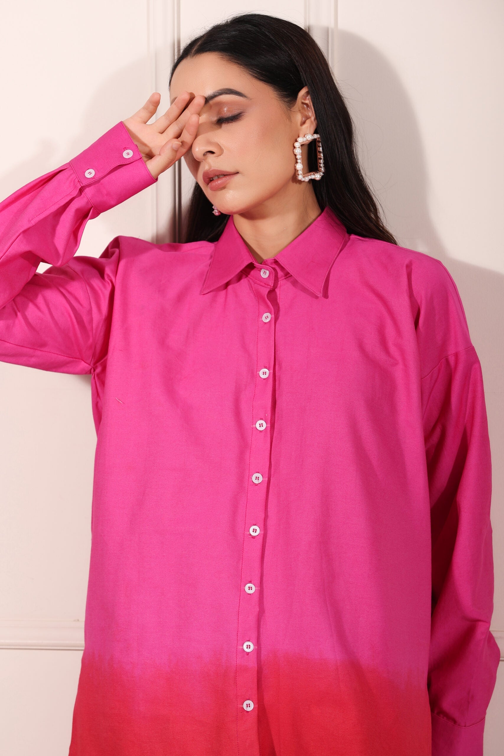 Trendy matching outfits for women featuring a vibrant pink gradient button-up shirt by Stylera