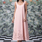 Stylera pale pink sleeveless scoop neck dress with laser cut hem on model wearing trendy maxi dress for women