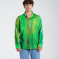 Stylera trendy men’s casual button up shirt in green with a vibrant, colorful design