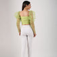 Trendy mesh crop top for women in vibrant green with puff sleeves and stylish back view