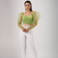 Trendy mesh crop top for women in green with long puff sleeves, paired with white high-waisted pants