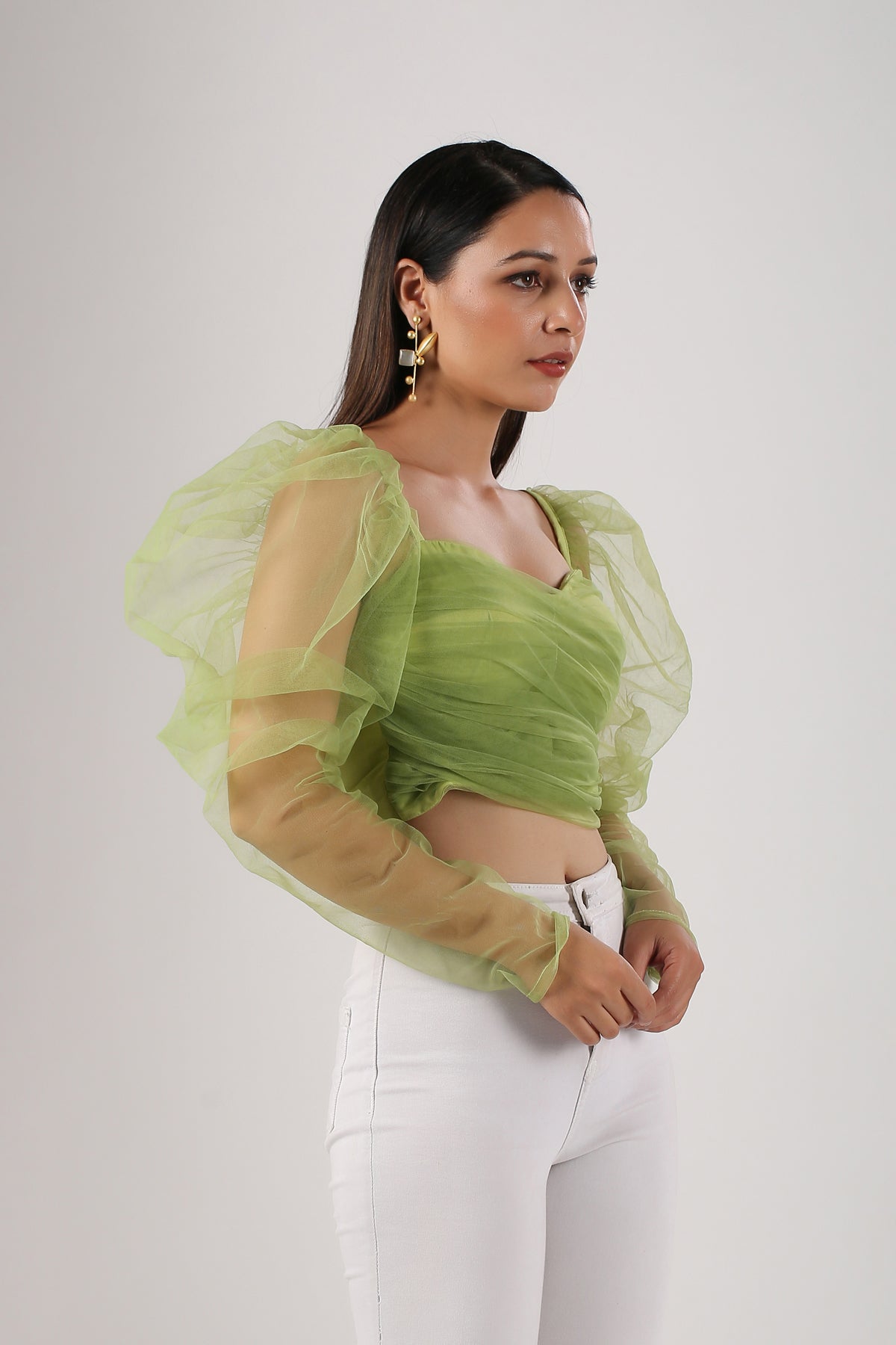 Trendy mesh crop top for women in green with puff sleeves, perfect for casual outings