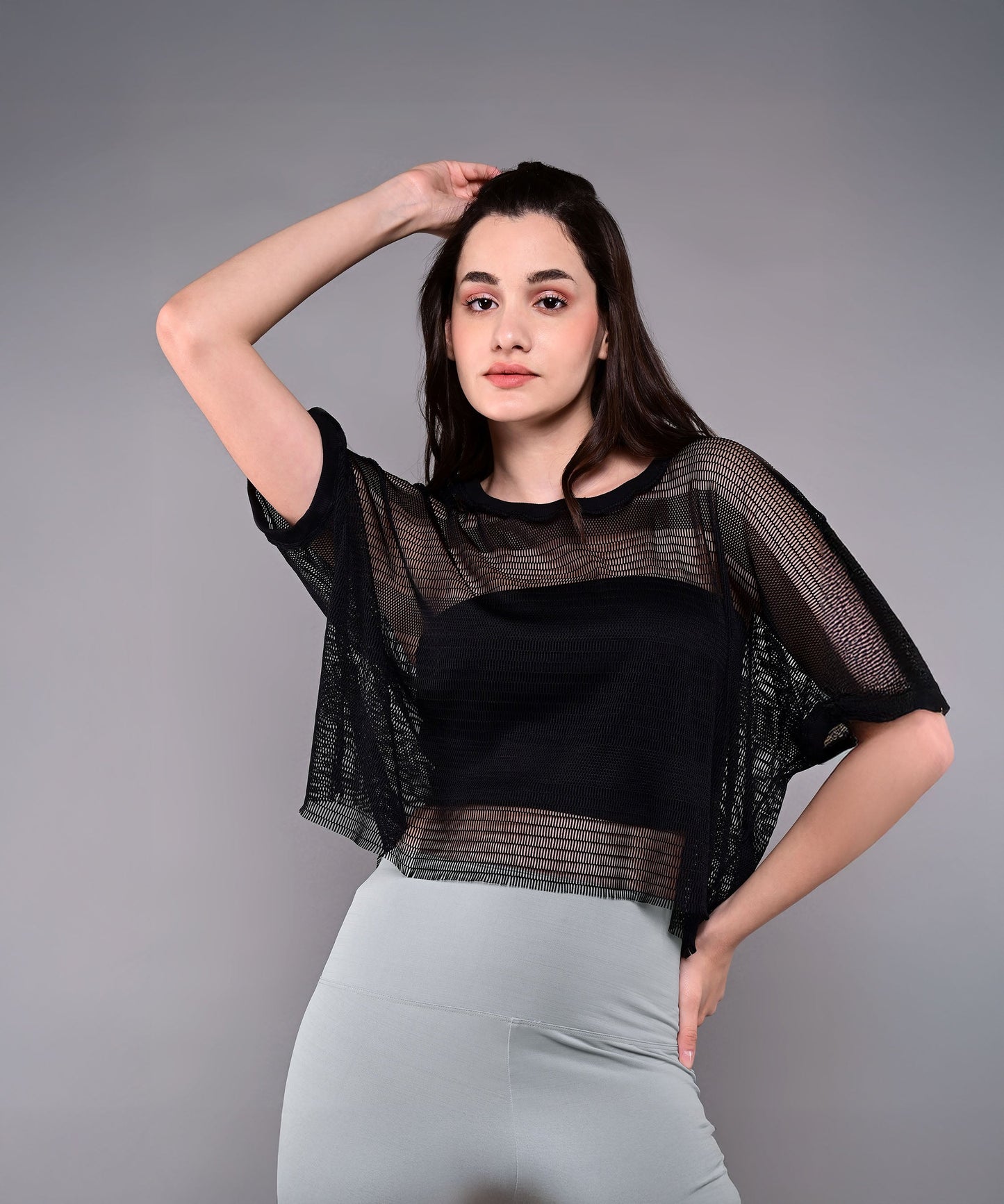 Stylera  trendy mesh tops for women in black with a relaxed fit and stylish design