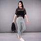 Trendy mesh tops for women in black, paired with light leggings, perfect for casual outings