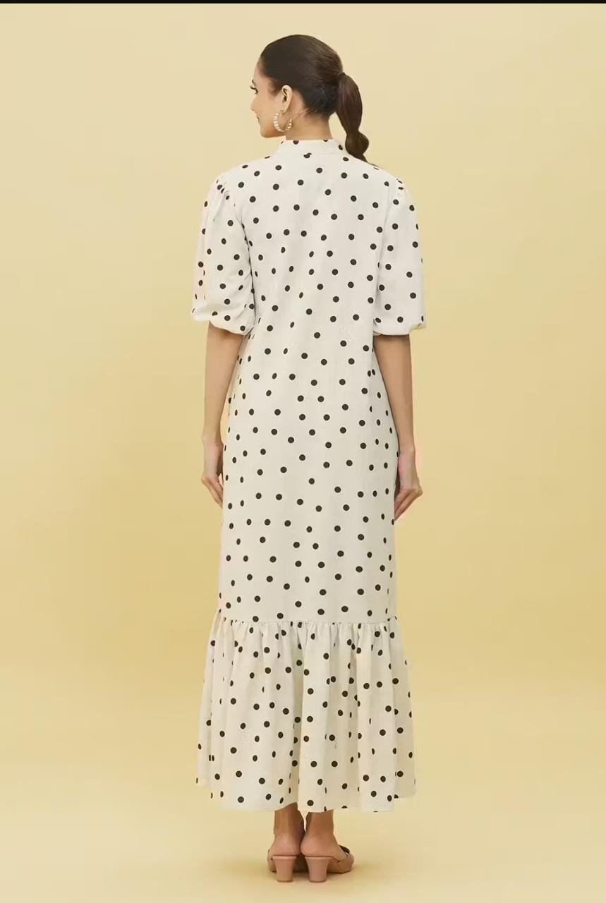 Back view of Stylera white polka dot trendy midi dress for women with ruffle hem and short sleeves