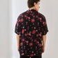 Back view of trendy oversized button up shirt from Stylera with colorful floral pattern
