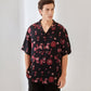 Trendy oversized button up shirt in black with floral print for a stylish, relaxed look