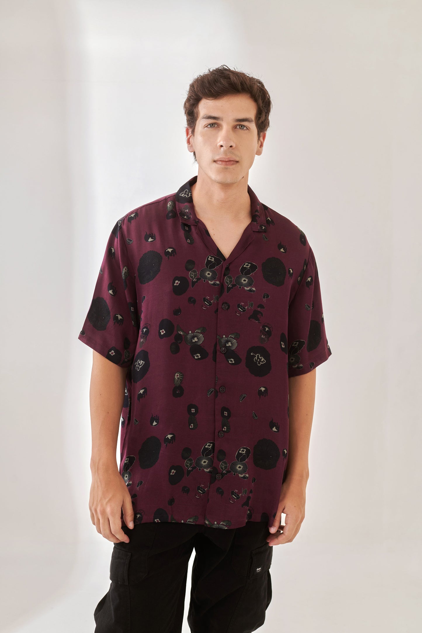 Trendy oversized shirt for men in dark purple with abstract print, perfect for casual outfits.