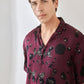 Trendy oversized shirt for men in burgundy with unique floral designs for a stylish casual look