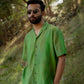 Trendy oversized shirt for men in green with button-up design, perfect for casual outings