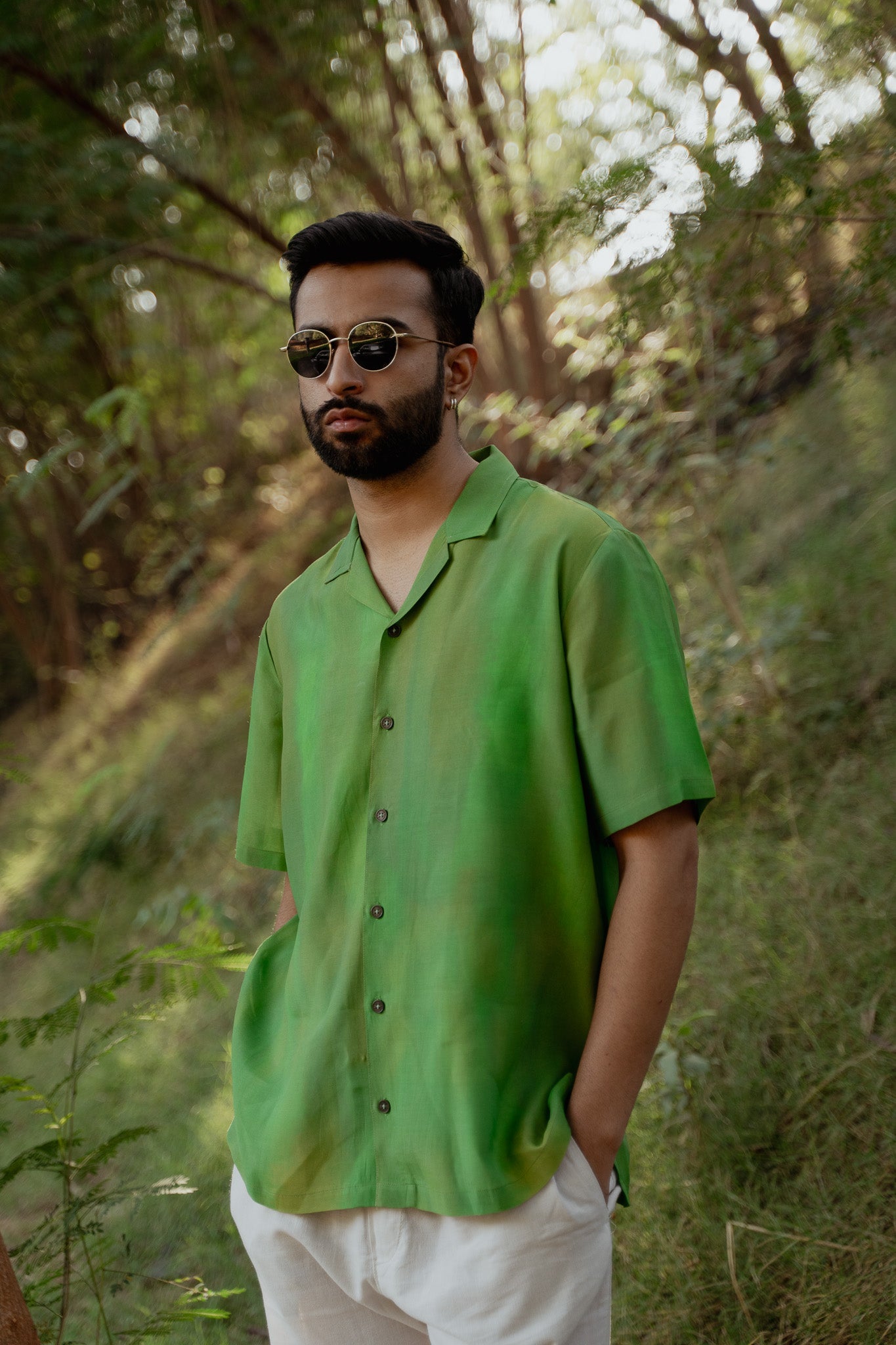 Trendy oversized shirt for men in green with button-up design, perfect for casual outings
