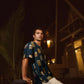 Trendy oversized shirt for men in navy with a unique print, styled for a casual evening look