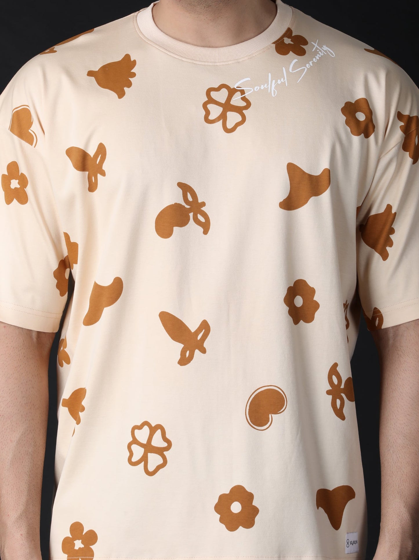 Stylstpls trendy oversized t-shirt for summer featuring a floral and butterfly design in warm colors