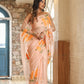 Trendy peach saree with floral design featuring elegant embroidery and lightweight fabric