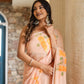 Stylish model wearing a trendy peach saree with floral design for special occasions