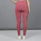 Stylish back view of trendy pink gym leggings by Stylera for workouts and training sessions