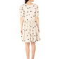Trendy polka dots midi dress in cream with black dots and a flattering tiered design